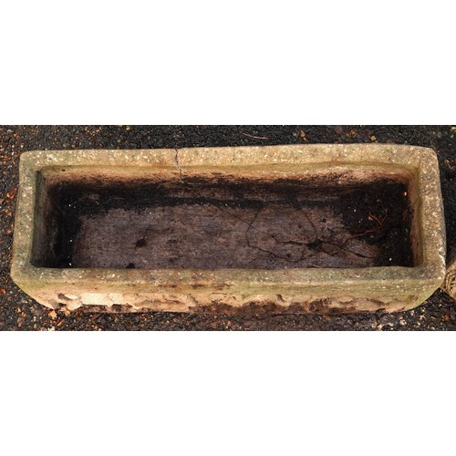 2219 - Pair of large rectangular garden stoneware planters decorated with Putti, 26cm H x 82cm W x 26cm D