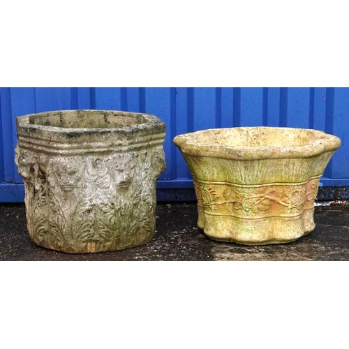 2224 - Two garden stoneware garden planters, one decorated with lion heads, the largest 34cm high