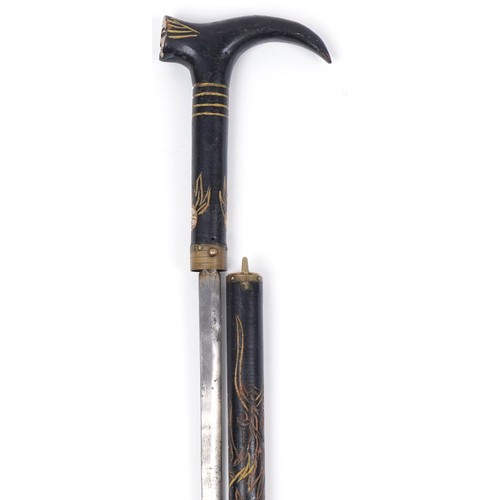 660 - Chinese ebonised walking swordstick carved with a dragon chasing the flaming pearl, 96cm in length