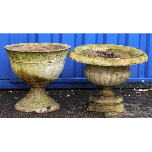 2226 - Two circular garden stoneware planters, the largest 36cm high