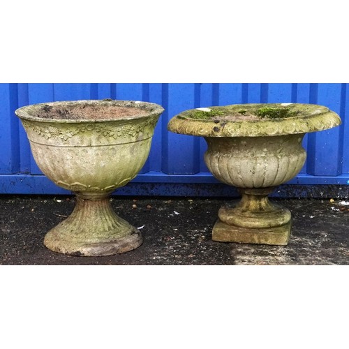 2226 - Two circular garden stoneware planters, the largest 36cm high