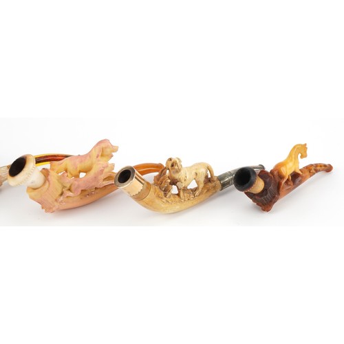 1253 - Five antique Meerschaum smoking pipes housed in fitted cases, each carved with animals, four with am... 