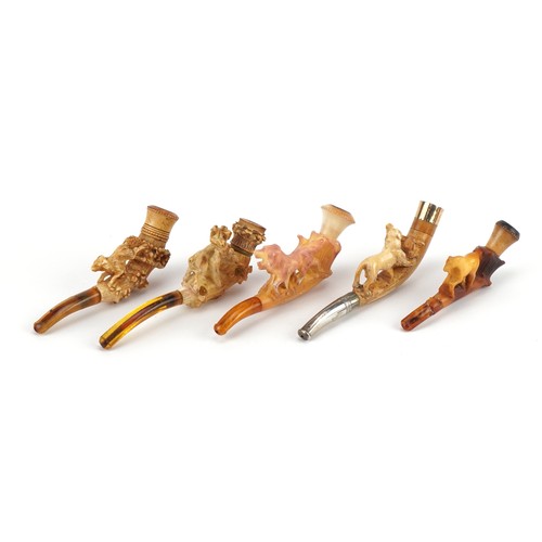 1253 - Five antique Meerschaum smoking pipes housed in fitted cases, each carved with animals, four with am... 