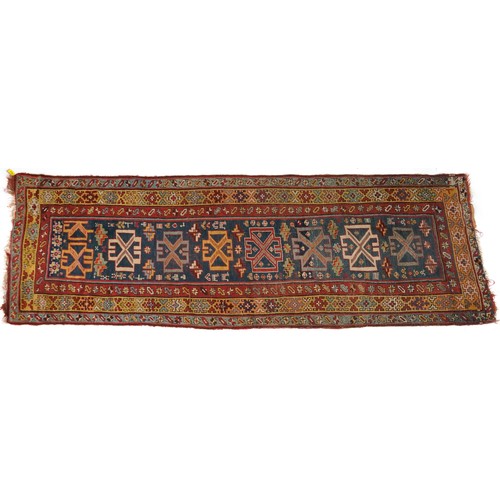 2195 - Rectangular Persian rug with blue ground central field having an allover repeat design, 270cm x 100c... 