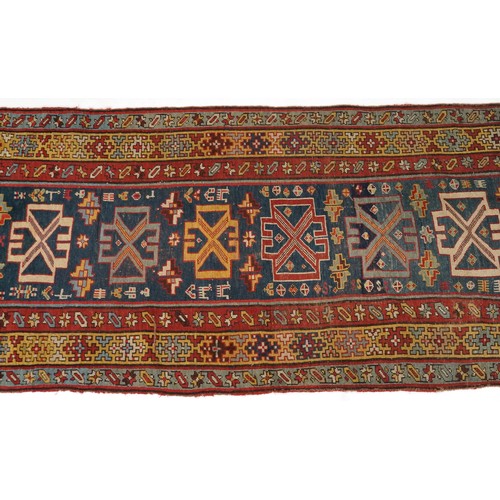 2195 - Rectangular Persian rug with blue ground central field having an allover repeat design, 270cm x 100c... 