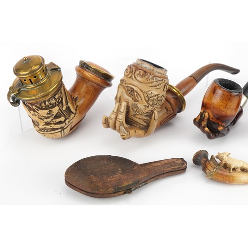 1252 - Six antique Meerschaum smoking pipes including three carved with hands, one carved with a wild anima... 