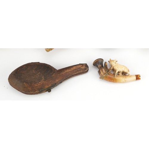 1252 - Six antique Meerschaum smoking pipes including three carved with hands, one carved with a wild anima... 