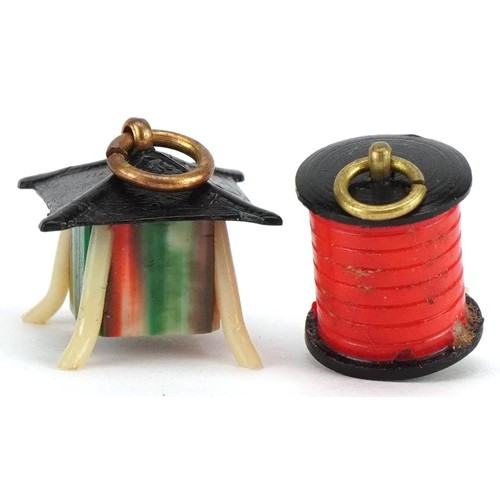 201 - Two Japanese Kobe eye popping charms, the largest 1.9cm high