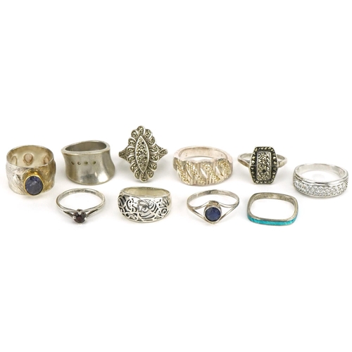 3396 - Ten silver rings, some Modernist, including marcasite and blue enamel, various sizes, 41.4g