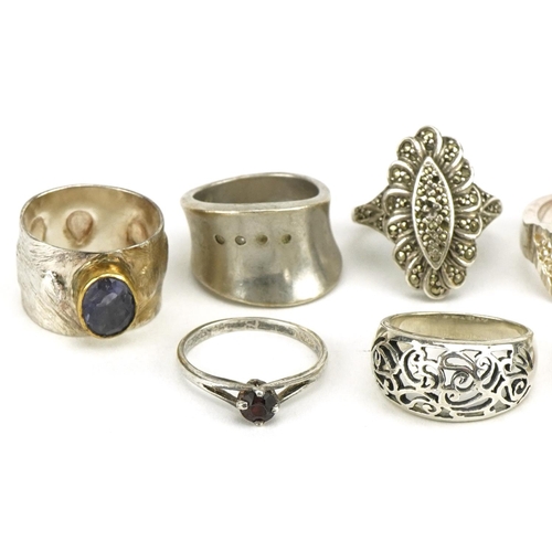 3396 - Ten silver rings, some Modernist, including marcasite and blue enamel, various sizes, 41.4g