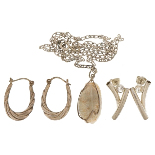 3711 - Silver and white metal jewellery comprising two pairs of earrings and a shell pendant on a curb link... 