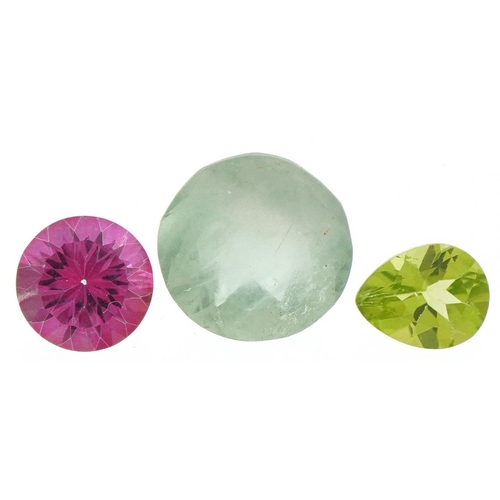 3513 - Three natural gemstones with certificates comprising topaz, pink topaz and peridot