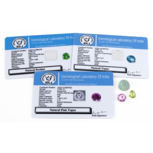 3513 - Three natural gemstones with certificates comprising topaz, pink topaz and peridot