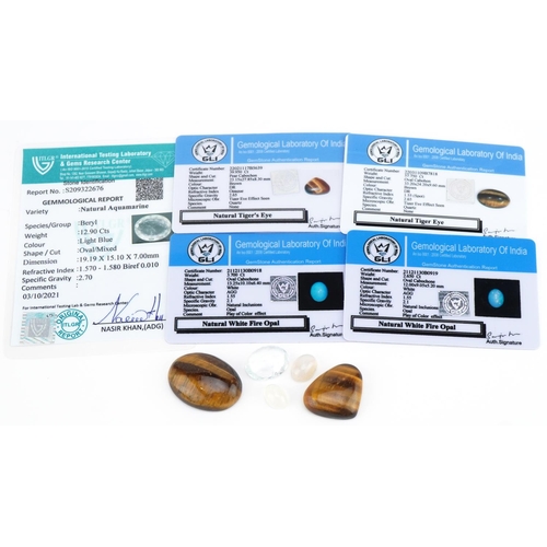 3746 - Five natural gemstones with certificates comprising white fire opal, tiger's eye and aquamarine