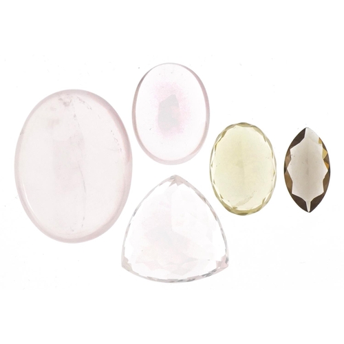 3600 - Five loose natural quartz gemstones with certificates comprising rose quartz, lemon quartz and smoky... 