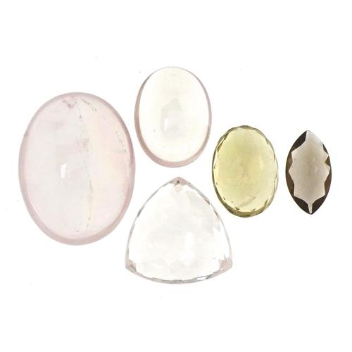 3600 - Five loose natural quartz gemstones with certificates comprising rose quartz, lemon quartz and smoky... 