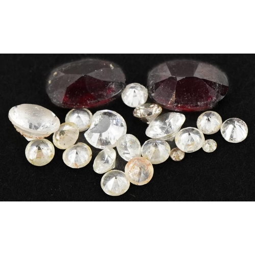 3632 - Loose gemstones including diamonds, garnets and white sapphires, the largest approximately 6mm in le... 