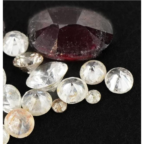 3632 - Loose gemstones including diamonds, garnets and white sapphires, the largest approximately 6mm in le... 