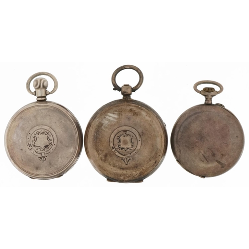 3399 - Three gentlemen's silver open face pocket watches including Waltham, the largest 54mm in diameter