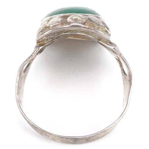 2785 - Embossed silver cabochon green hardstone ring with pierced love heart shoulders, size J, 3.9g