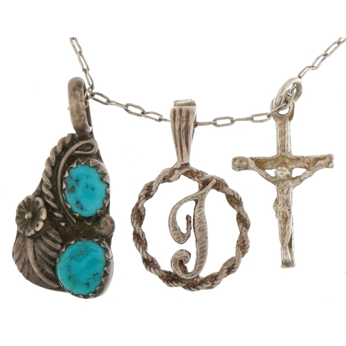 2737 - Three silver and white metal pendants, one with turquoise, on a silver necklace, 3.8g