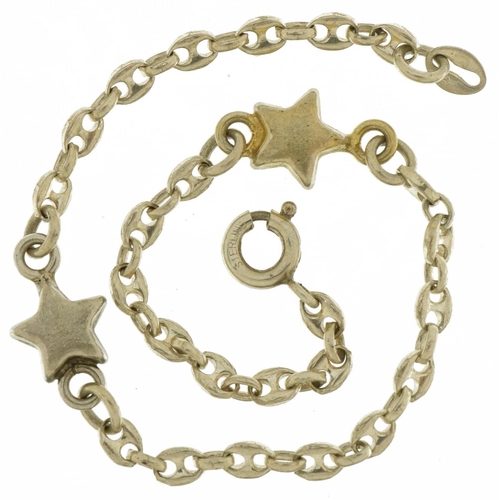 2639 - Silver gucci and star link bracelet, 18cm in length, 4.7g