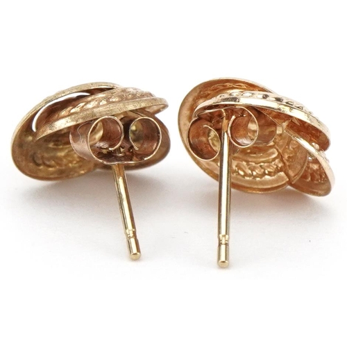 2039 - Pair of 9ct gold knot design stud earrings, 8.5mm in diameter, 0.5g