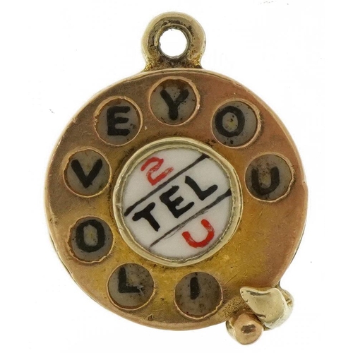 2163 - 9ct gold and enamel telephone dial, 2 Tel U I love you charm, 1.2cm in diameter, 2.2g