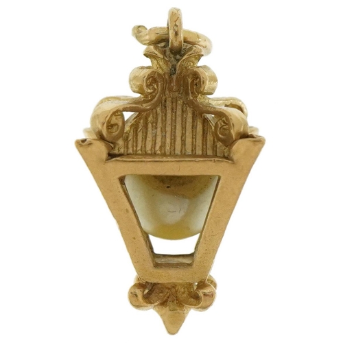 2194 - 9ct gold pearl lantern charm, 2.1cm high, 3.4g