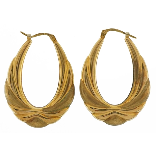 2058 - Pair of 9ct gold and embossed Gypsy hoop earrings, 3.4cm high, 3.8g