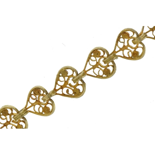 2631 - Silver gilt filigree love heart bracelet, 16cm in length, 6.5g