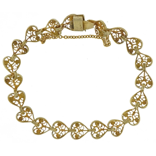 2631 - Silver gilt filigree love heart bracelet, 16cm in length, 6.5g