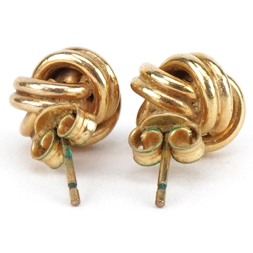 2111 - Pair of 9ct gold knot design stud earrings, 1cm wide, 1.8g