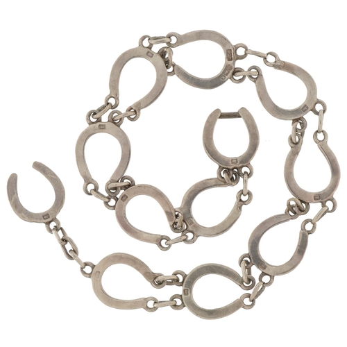 2675 - Silver lucky horseshoe bracelet, 18cm in length, 8.5g