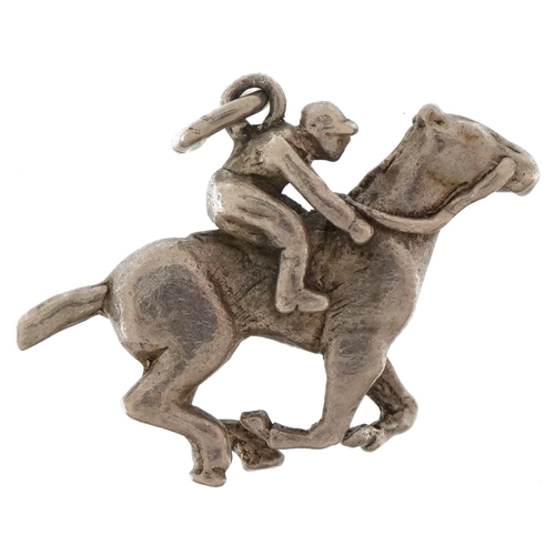 2758 - Silver jockey on horseback charm, 2.6cm wide, 6.1g