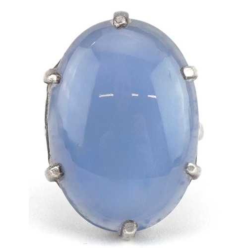 2629 - Silver cabochon blue stone ring, the stone approximately 25mm x 17mm, size N/O, 7.5g