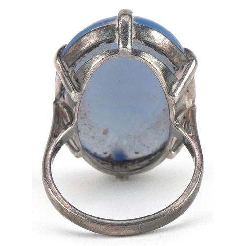 2629 - Silver cabochon blue stone ring, the stone approximately 25mm x 17mm, size N/O, 7.5g