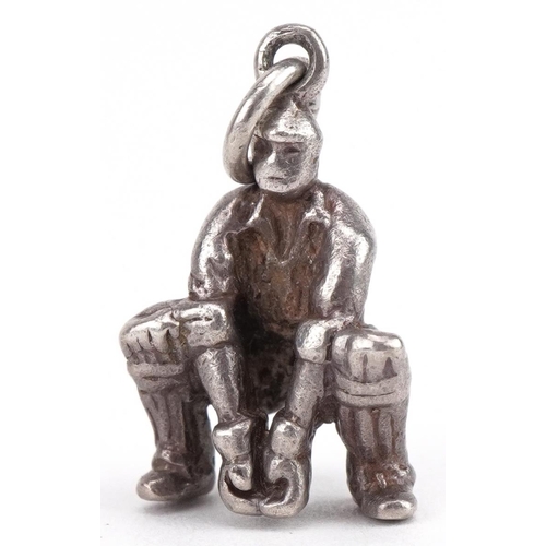 2745 - Silver wicket-keeper cricketer charm, 1.9cm high, 4.0g