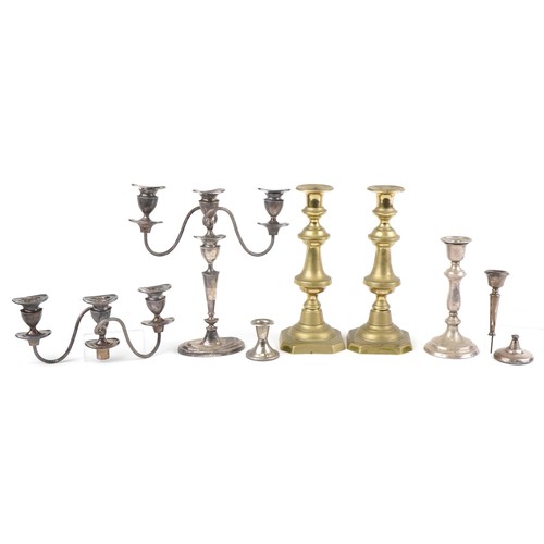 2638 - Antique and later candlesticks including a silver example, the largest 29.5cm high