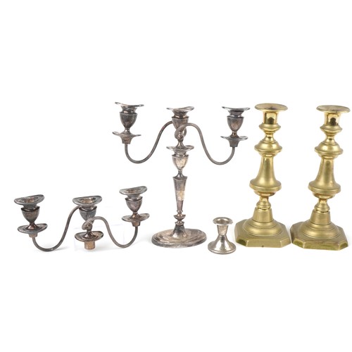 2638 - Antique and later candlesticks including a silver example, the largest 29.5cm high