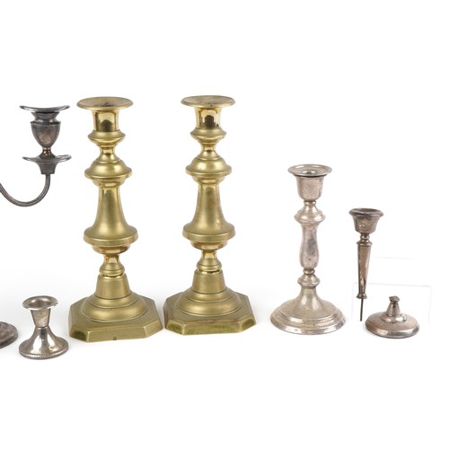 2638 - Antique and later candlesticks including a silver example, the largest 29.5cm high