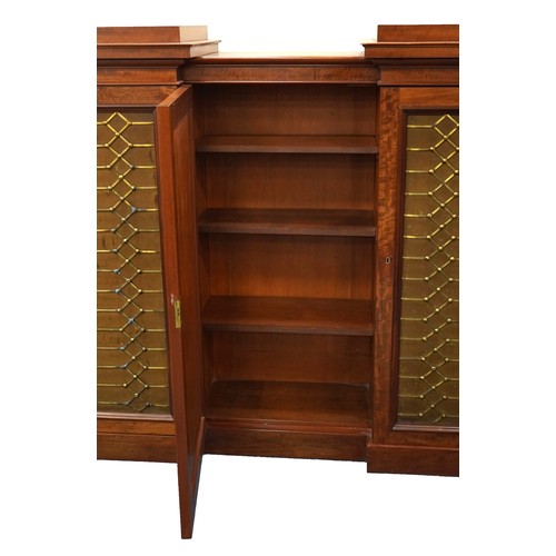 2005 - William IV Cuban ‘fiddleback’ mahogany library bookcase with five brass grill fronted doors, each en... 