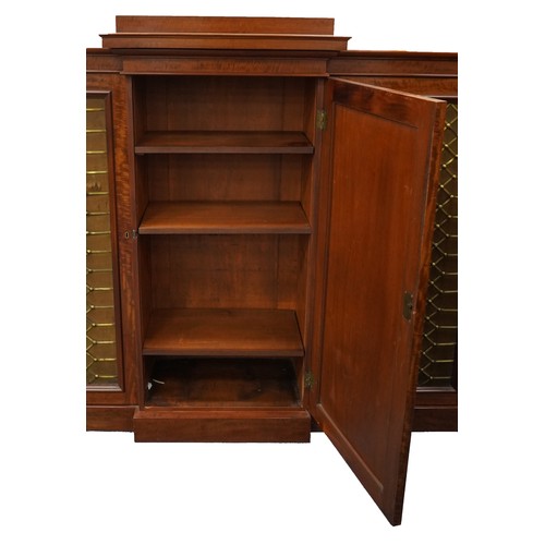 2005 - William IV Cuban ‘fiddleback’ mahogany library bookcase with five brass grill fronted doors, each en... 