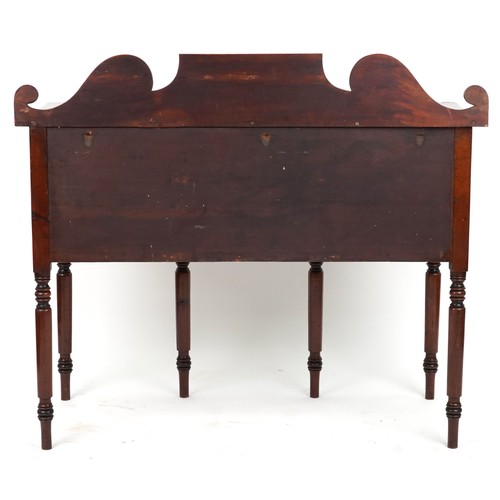 2071 - Victorian cross banded mahogany sideboard fitted with an arrangement of four drawers on turned legs,... 