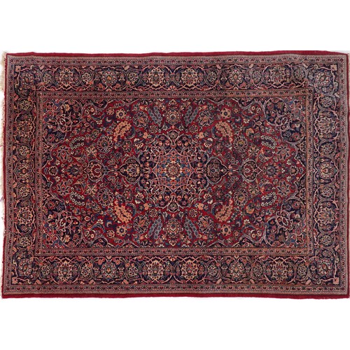 2182 - Rectangular Persian Sarouk type part silk red ground rug having an allover floral design, 214cm x 13... 