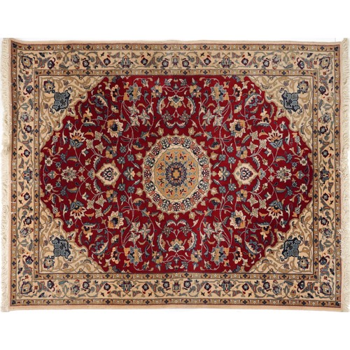 2184 - Rectangular Indian Rani rug having an allover repeat floral design on the red and cream grounds, 254... 