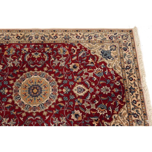 2184 - Rectangular Indian Rani rug having an allover repeat floral design on the red and cream grounds, 254... 