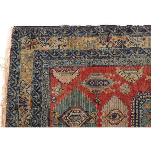 2187 - Rectangular Persian rug having an all over floral design, 158cm x 95cm