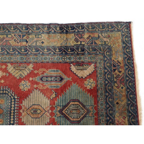 2187 - Rectangular Persian rug having an all over floral design, 158cm x 95cm