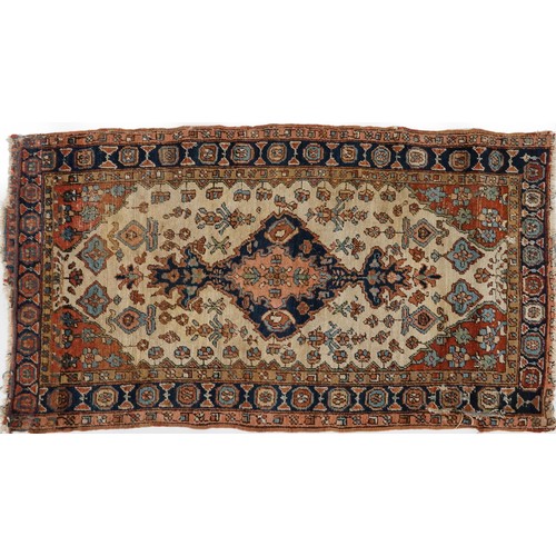 2196 - Rectangular Persian brown ground rug having a repeat diamond central field, 270cm x 157cm